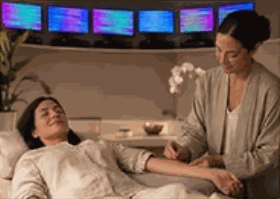 Acupuncture session with EES screens in the background